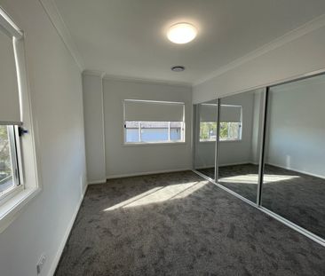 NEAR NEW SPACIOUS FOUR BEDROOM TOWNHOUSE - Photo 3