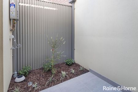 NEWLY BUILT! ARCHITECTURAL TOWNHOUSE IN BRUNSWICK AWAITS YOU - Photo 4