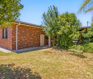 Charming & Easy-Care Brick Home with Inviting Outdoor Spaces - Photo 5