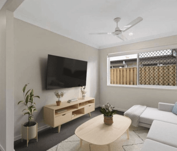 Modern Family Home in Logan Reserve - Photo 3