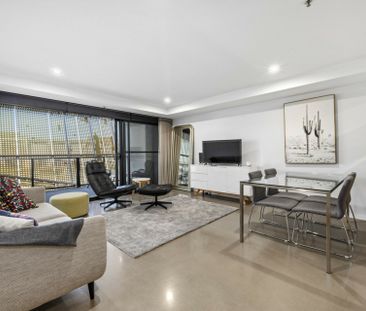 Highend Living on Lonsdale - Fully Furnished - Photo 1