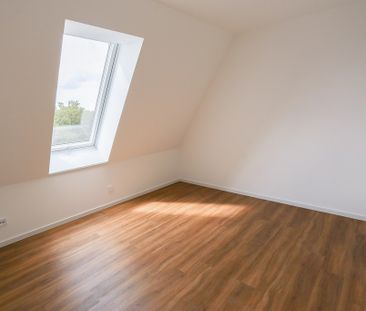 Licht durchflutet - 2-Zimmer-Dachgeschosswohnung mit eindrucksvolle... - Foto 1