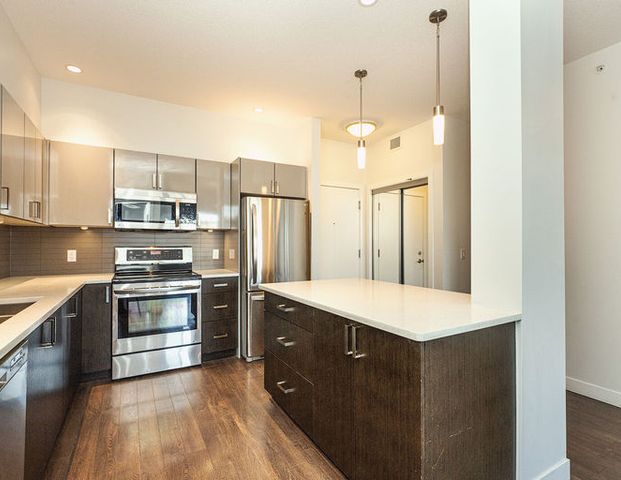 Spacious 2BD+ big Den Condo with Underground Parking and Lake Access | Calgary - Photo 1