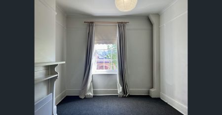 Updated and ready, right in the City Centre! - Photo 2