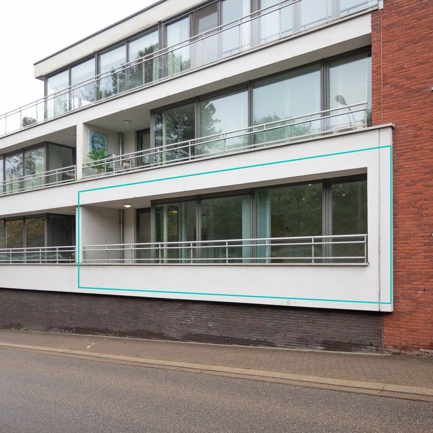 LICHTRIJK APPARTEMENT MET 2 SLAAPKAMERS EN PARKEERPLAATS AAN HET CENTRUM VAN BILZEN - Photo 1