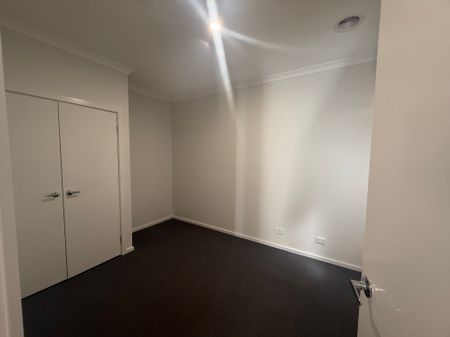 Modern Four-Bedroom Home with Contemporary Brick Features & Double Garage - Photo 3