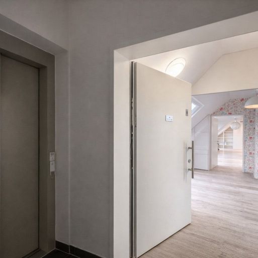 Maisonette-Dachgeschosswohnung mit Lift auf beiden Ebenen, großzügigen Terrassenflächen & Tiefgaragenplatz - Photo 1