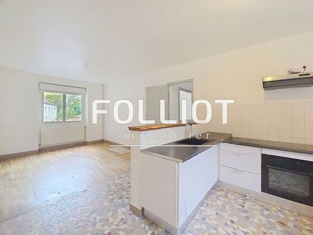 À louer : maison spacieuse avec garage, centre-ville et voie verte à pied - Photo 2