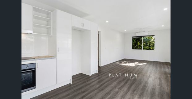 Charming Coastal Home in the Heart of Palm Beach! - Photo 1