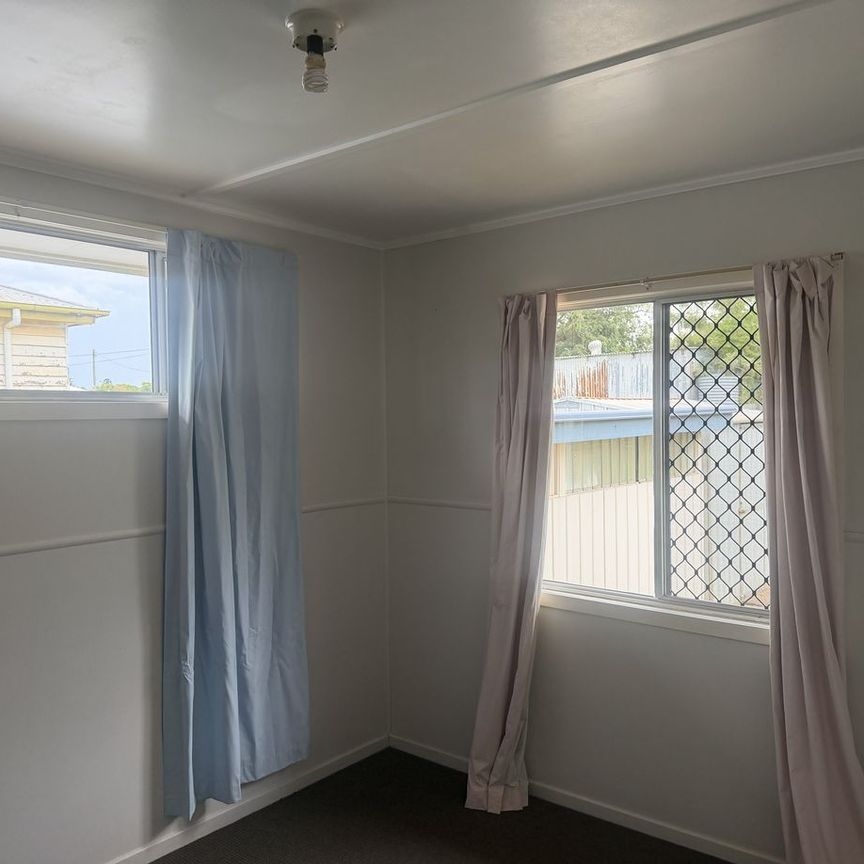 Tidy Home Close to Town and Park - Photo 1