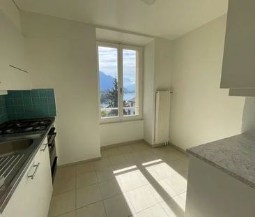 Appartement de 3.5 pièces au 4ème étage avec vue sur le lac. - Photo 1