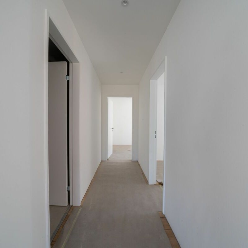 Erstbezug 3.5-Zimmer-Gartenwohnung mit ca. 138 m2 Rasenfläche - Photo 1
