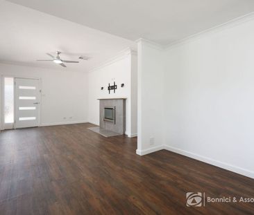 MODERN THREE-BEDROOM HOME - Photo 1