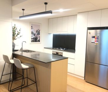 Fully Furnished 1-Bedroom Apartment with Secure Parking in the Hear... - Photo 6