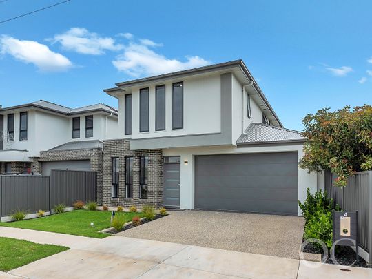 Open the Door to Sun-Soaked Living in a Premium Woodville West Pocket - Photo 1