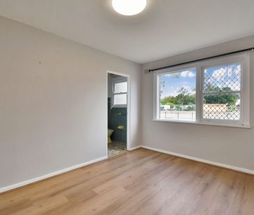 Comfortable & Convenient 1-Bedroom Apartment in Prime Location - Photo 1