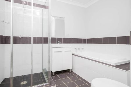 Immaculate and Convenient Two Bedroom Villa - Photo 5