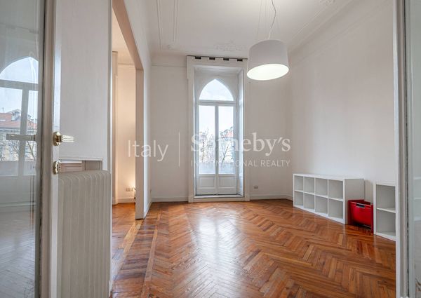 Spacious renovated apartment with balconies in a historic building