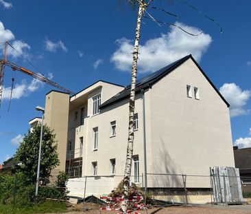 Ein architektonisches Highlight: Wohnen im historischen Schulgebäude mit modernster Technik! - Photo 1