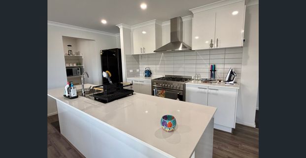 Relaxed Coastal Living in a Family-Friendly Location - Photo 1