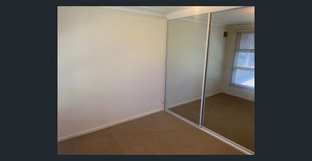 Spacious 4-Bedroom Home - Photo 4