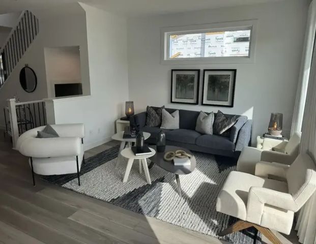 Brand new, beautiful modern duplex in the trendy seton area. | 45 St SE, Calgary - Photo 1