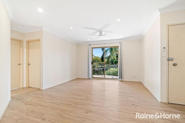 Top Floor Apartment with Space, Sun & Convenience - Photo 1