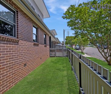 Three bedroom, two bathroom townhouse with double auto-door garage - Photo 2