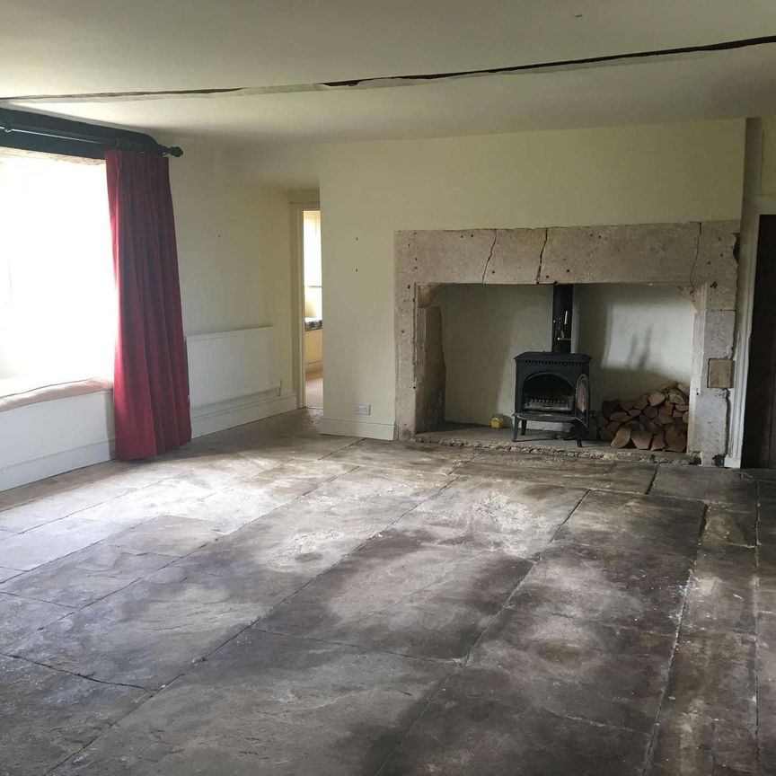 An imposing five-bedroom detached farmhouse on the edge of Neston village, blending original character with modern comforts, set within a large garden and offer - Photo 1