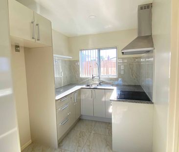 Brand-New 2-Bedroom Unit - Photo 1