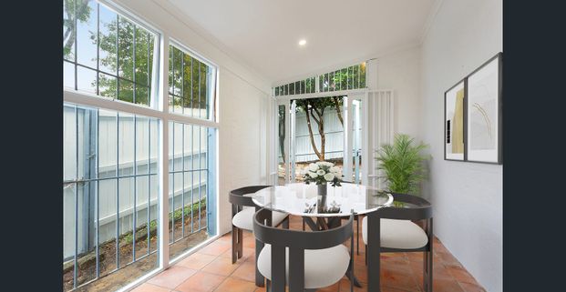 Charming Character Terrace with Modern Convenience - Photo 1