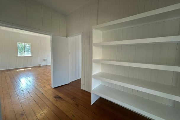 SPACIOUS QUEENSLANDER WITH EXTRA MULTI PURPOSE ROOM AVAILABLE NOW! - Photo 1