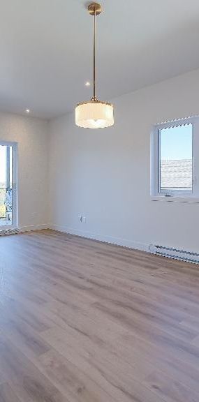 5 1/2 condo locatif neuf - Photo 1