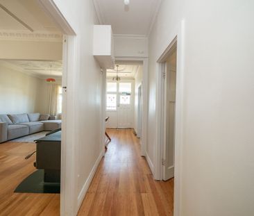 Cozy 3-Bedroom Home with Sleepout, Close to the Beach - Available J... - Photo 2