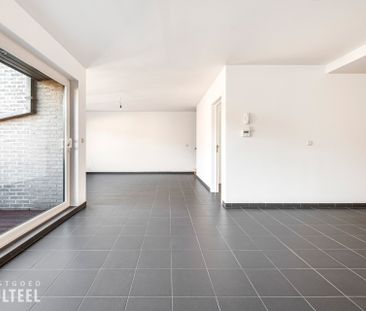 Ruim en lichtrijk duplex appartement in het centrum van Belsele! - Photo 2