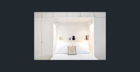 Private and beautifully renovated apartment with undercover security parking - Photo 4