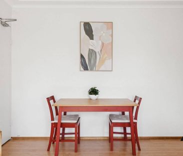 Leafy Top-Floor Haven with Dual Balconies and Modern Comfort - Photo 2