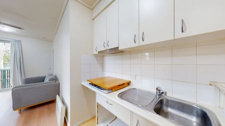 Wrap-Around Balcony Living in the Heart of Lygon Street - Photo 4