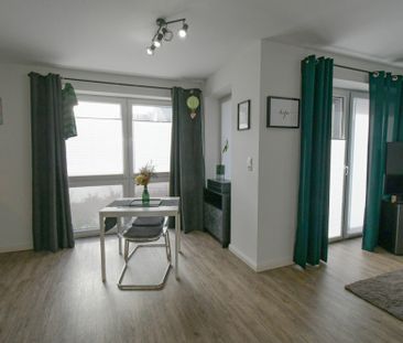 1284 - Moderne 2-Zimmer-Erdgeschosswohnung mit EBK in Oldenburg/Kre... - Photo 2