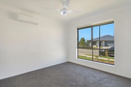 A modern sanctuary in a peaceful, family-friendly pocket, this beautifully finished 4-bedroom home delivers effortless living with a touch of luxury. - Photo 3