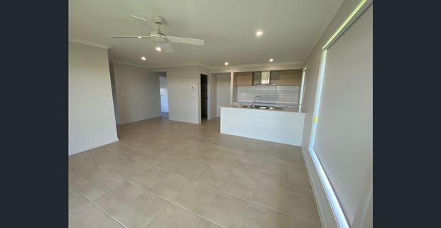 Coastal Meets Lakeside – Stunning New 4-Bedroom Home - Photo 1