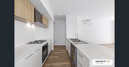 NEWLY BUILT CORNER TOWNHOUSE 2 BEDROOM PLUS 2 LIVING AREAS WITH UNINTERRUPTED VIEWS - Photo 2