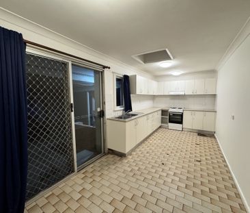 COMFORTABLE 3 BEDROOM HOME WITH GREAT OUTDOOR SPACE !! - Photo 6