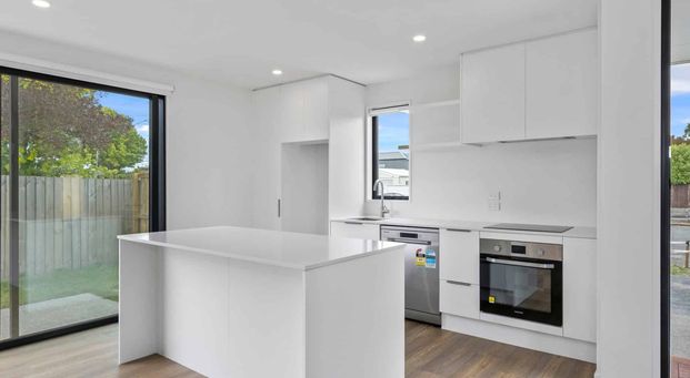 Architecturally Designed Townhouse - Photo 1