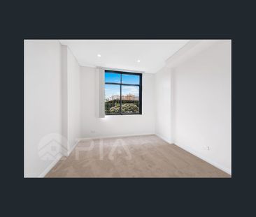 SPACIOUS TWO BEDROOM APARTMENT WITH LARGE COVERED BALCONY - Photo 3