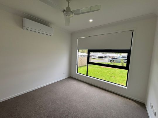 Brand New Four Bedroom Home! - Photo 1