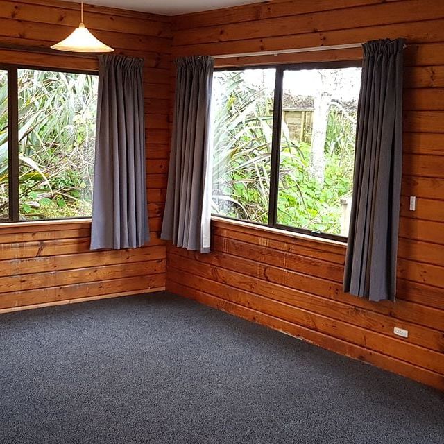 Charming 3BR Home in Serene Paremoremo - Photo 1