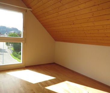 Moderne 4.5-Zimmer-Maisonette-Wohnung in idyllischer Lage - Foto 4