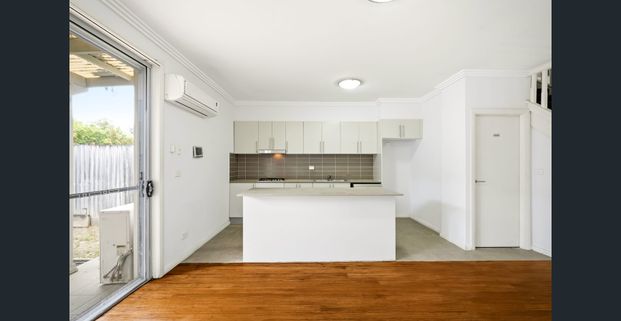 Good Size Townhouse With Fresh Updates Throughout! - Photo 1