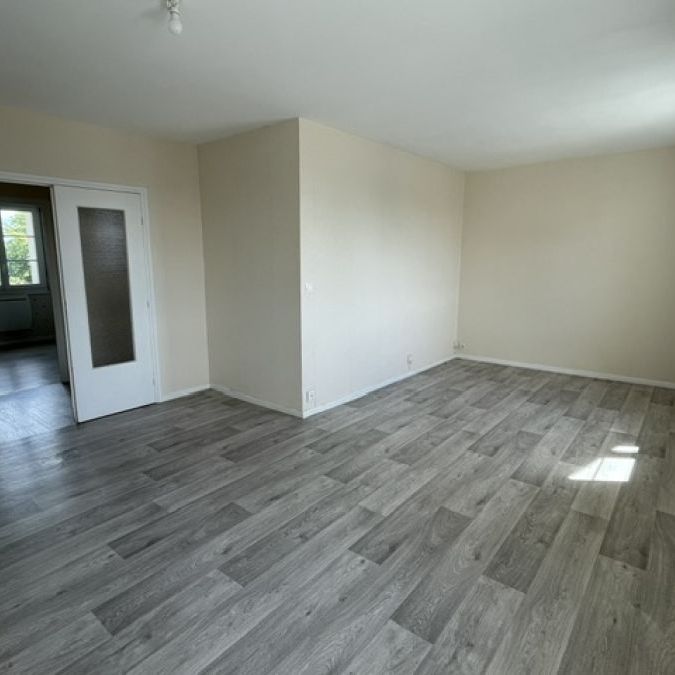 SPACIEUX T3 AVEC ASCENSEUR CAVE ET PARKING SOUS TERRAIN - Photo 1